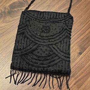 Cute black beaded bag with 24 inch beaded strap
